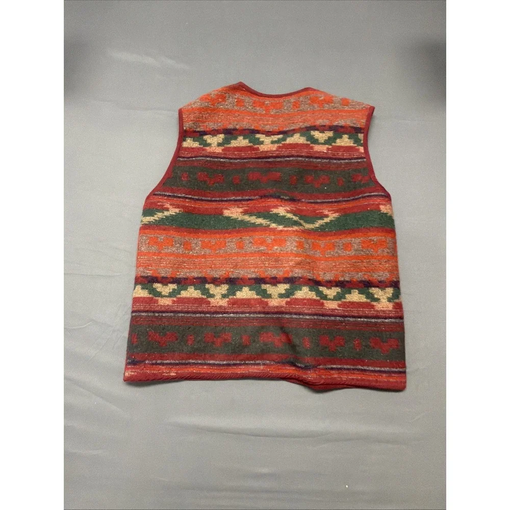 Ride brand Southwestern-style vest features a vibrant geometric pattern in red L